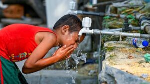 new-delhi--india---june-12-a-boy-quenches-his-thirst-from-a-water-tank-tap-from-scorching-heat-wave-24445742-16x9_1